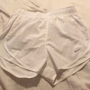 White Nike shorts